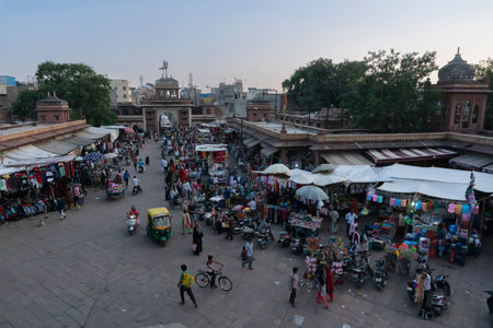 Jodhpur, Rajasthan, India - 16.10.2019 : View from top, famous Sardar Market and Ghanta ghar Clock tower with Mehrangarh fort in background.のeditorial素材