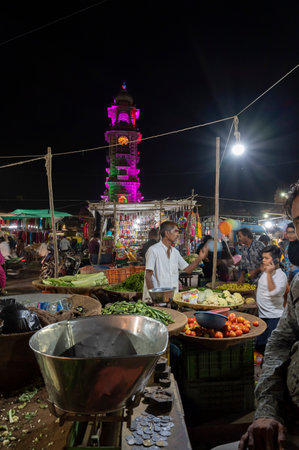 Jodhpur, Rajasthan, India - 18.10.2019 : Vegetable seller selling green vegetables at famous Sardar Market and Ghanta ghar Clock tower in Jodhpur, Rajasthan, India.のeditorial素材