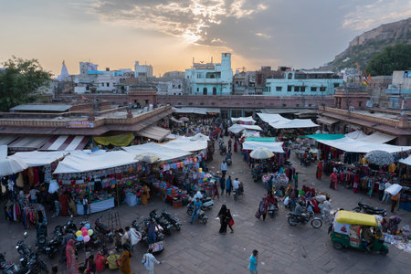 Jodhpur, Rajasthan, India - 16.10.2019 : View from top, famous Sardar Market and Ghanta ghar Clock tower with Mehrangarh fort in background.のeditorial素材
