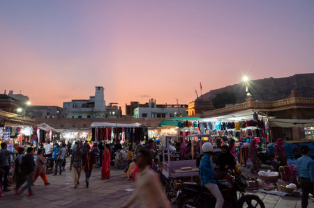 Jodhpur, Rajasthan, India - 19.10.2019 : Blue hour image of famous Sardar Market and Ghanta ghar Clock tower in Jodhpur, Rajasthan, India. Mehrangarh fort or Jodhpur fort in background.のeditorial素材