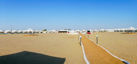 Thar desert, Rajasthan, India - 16.10.2019 : Panoramic view of desert camp in the morning. Tourists arrive in the camp to enjoy view of Thar desert.のeditorial素材