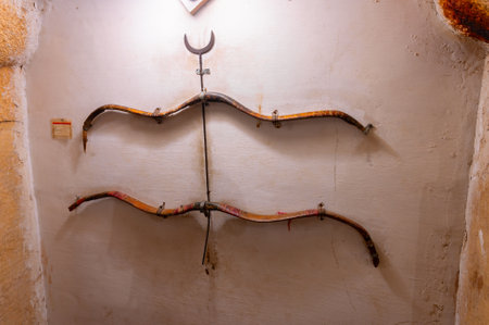 Jaisalmer, Rajasthan, India - 15th October 2019 : Beautifully made antique royal bows and arrow, displayed at Raja ka Mahal Palace or Maharwal Palace inside Jaisalmer fort.のeditorial素材
