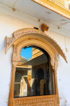 Jaisalmer, Rajasthan, India - 15th October 2019 : Reflection on glass of sandstone made beautiful jharokha, stone window of exterior of Rani Mahal or Rani Ka Mahal, inside Jaisalmer fort.のeditorial素材