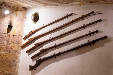 Jaisalmer, Rajasthan, India - 15th October 2019 : Beautifully made antique royal rifles, bonduks displayed at Raja ka Mahal Palace or Maharwal Palace inside Jaisalmer fort.のeditorial素材