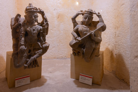 Jaisalmer, Rajasthan, India - 15th October 2019 : Beautiful stone made antique sculptures of Hindu Gods and Goddesses inside museum of Rani Ka Mahal, Jaisalmer fort. Lord Vaman and Goddess Saraswati.のeditorial素材