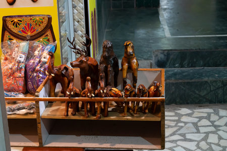 Jodhpur, Rajasthan, India - 20.10.2019 : Wooden animal toys are displayed for sale at famous Sardar Market and Ghanta ghar Clock tower in Jodhpur, Rajasthan, India.のeditorial素材