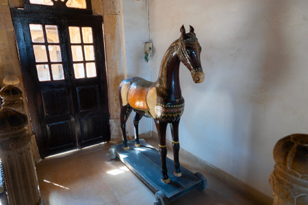 Jaisalmer, Rajasthan, India - 15th October 2019 : Beautiful wooden horse stored inside museum of Rani ka Mahal, Jaisalmer fort. UNESCO World heritage site.のeditorial素材