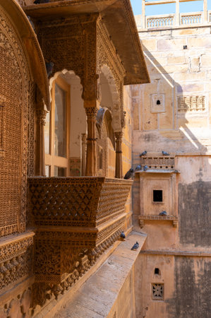 Jaisalmer, Rajasthan, India - 15th October 2019 : Sandstone made beautiful balcony, jharokha, stone window and exterior of Rani Mahal or Rani Ka Mahal, inside Jaisalmer fort.のeditorial素材