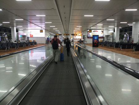 Delhi, India - 20th January 2019 : Horizontal escalator for passengers with luggage at Indira Gandhi Inernational Airport, IGI. Busiest airport of India, serving capital New Delhi and northern India.のeditorial素材