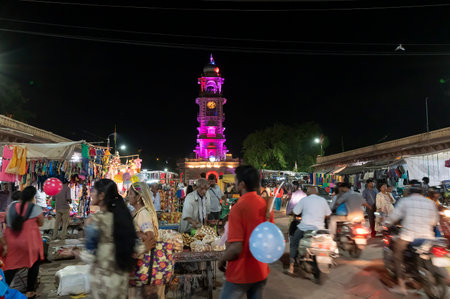 Jodhpur, Rajasthan, India - 20.10.2019 : Rajasthani street food is being sold at road side food stall at night at famous Sardar Market and Ghanta ghar Clock tower in Jodhpur, Rajasthan, India.のeditorial素材