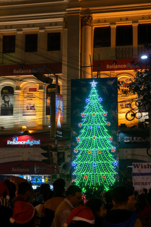 Kolkata, West Bengal, India - 26.12.2018 : Decorated Christmas tree, lights and Christmas celebration at illuminated Park street with joy and year end festive mood.のeditorial素材