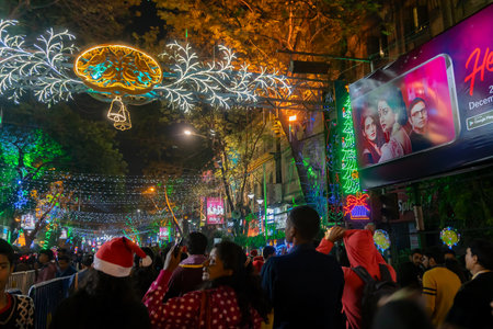 Kolkata, West Bengal, India - 25.12.2018 : Decorated lights and Christmas celebration at illuminated Park street with joy and year end festive mood. Night sky background.のeditorial素材
