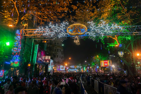 Kolkata, West Bengal, India - 25.12.2018 : Decorated lights and Christmas celebration at illuminated Park street with joy and year end festive mood. Night sky background.のeditorial素材