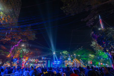 Kolkata, West Bengal, India - 25.12.2018 : Decorated lights and Christmas celebration at illuminated Park street and Camac Street junction . Citizens enjoying with joy and year end festive mood.のeditorial素材