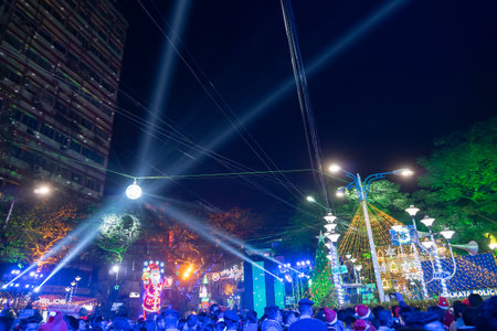 Kolkata, West Bengal, India - 25.12.2018 : Decorated lights and Christmas celebration at illuminated Park street and Camac Street junction . Citizens enjoying with joy and year end festive mood.のeditorial素材