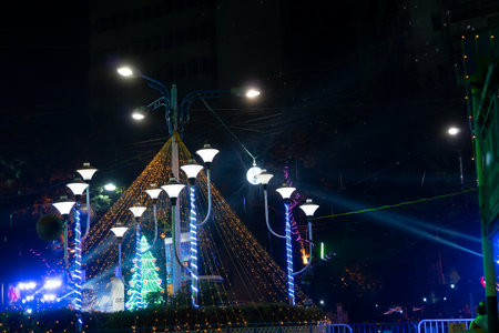 Kolkata, West Bengal, India - 25.12.2018 : Decorated lights and Christmas celebration at illuminated Park street and Camac Street junction . Citizens enjoying with joy and year end festive mood.のeditorial素材