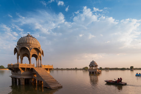 Chhatris, dome-shaped pavilions on Gadisar or Gadaria lake, Jaisalmer, Rajasthan, India. Built by King Rawal Jaisal,rebuilt by Gadsi Singh. An artificial lake once only water source of Jaisalmer city.のeditorial素材