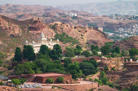 View of Jaswant Thada, cenotaph, from Mehrangarh fort Jodhpur,Rajasthan, India, Thada was built by Maharaja Sardar Singh, built of marble which emit a warm glow when illuminated by the Sun.の写真素材