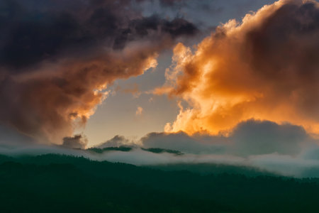 Dramatic clouds over Hiamalayan mountains after sun set, shot at Okhrey, Sikkim, India. Spectacular cloud formations making a beautiful sceneary. Sikkim,travel destination for tourists from worldwide.の写真素材
