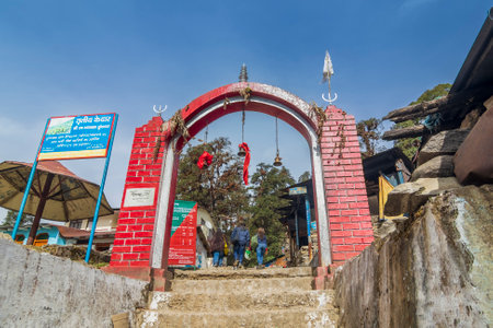 Chopta, Uttarakhand, India - 1st November 2018 : Red gateway for trekkers for Tungnath trek route, one of the highest Shiva temples in the world and it is the highest of the five Panch Kedar temples.のeditorial素材