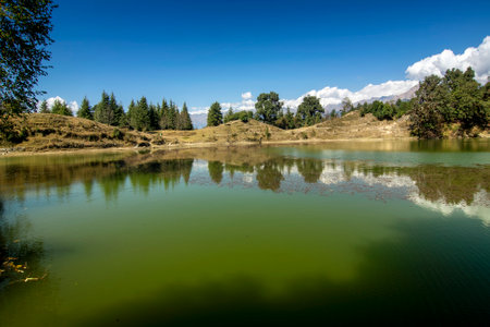 Sacred Devariyatal, Deoria Tal, Devaria or Deoriya, an emerald lake with miraculous reflections of Chaukhamba peaks on its crystal clear water. Chaukhamba peaks, Garhwal Himalayas, Uttarakahnd, India.の写真素材