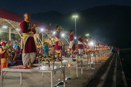 Tribeni Ghat, Rishikesh, Uttarakhand - 29th October 2018 : Ganga aarti being performed by Hindu priests to the chants of Vedic hymns. Crowded , biggest, most famous ghat at the banks of river Ganges.のeditorial素材