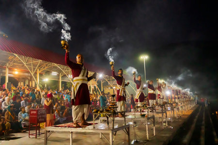Tribeni Ghat, Rishikesh, Uttarakhand - 29th October 2018 : Ganga aarti being performed by Hindu priests to the chants of Vedic hymns. Crowded , biggest, most famous ghat at the banks of river Ganges.のeditorial素材