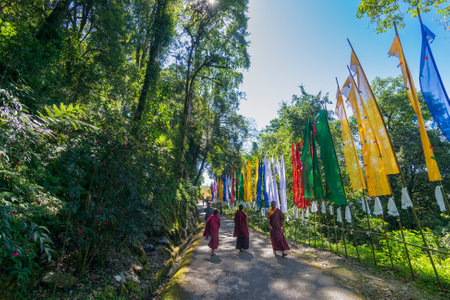 Samdruptse, Sikkim, India - 20th October 2016 : Monks walking on the road to Holy statue of Guru Padmasambhava or born from a lotus, Guru Rinpoche, a tantric Buddhist Vajra master from India.のeditorial素材