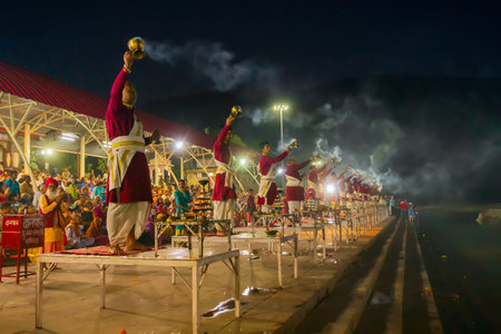 Tribeni Ghat, Rishikesh, Uttarakhand - 29th October 2018 : Ganga aarti being performed by Hindu priests to the chants of Vedic hymns. Crowded , biggest, most famous ghat at the banks of river Ganges.のeditorial素材