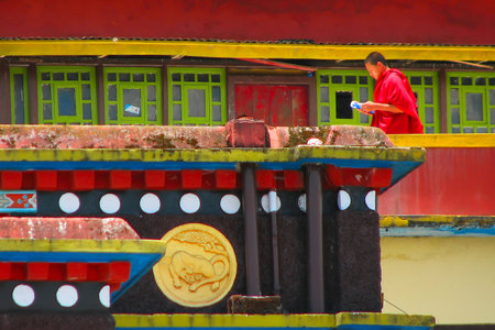 Gangtok, Sikkim, India - 9th May 2008 : A monky studying at Rumtek Monastery, Dharma Chakra Centre, is a gompa and seat-in-exile of the Gyalwang Karmapa, Sikkim, India.のeditorial素材