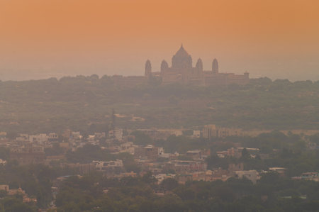 Top view of Jodhpur city as seen from famous Mehrangarh fort, Jodhpur, Rajasthan, India. Orange sky in the background. Mehrangarh Fort is UNESCO world heritage site popular amongst tourists worldwide.のeditorial素材