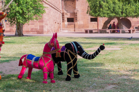 Hand made Rajasthani colourful dolls of horse and elephant displayed for sale at Mehrangarh Fort, Jodhpur, Rajasthan. Famous for colors and little dolls represent colors spread all across Rajasthan.のeditorial素材