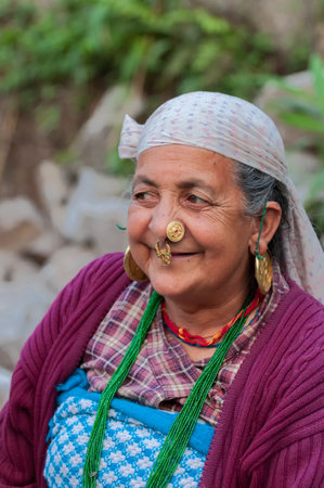 Sikkim, India - 23rd March 2004 : Senior citizen Sikkimese woman with smiling face. Sikkimese women are very hard working and they age very gracefully.のeditorial素材