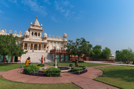 Jodhpur, Rajasthan, India - 20.10.2019 : Visitors enjoying beautiful decorated garden of Jaswant Thada cenotaph. Garden has carved gazebos, a tiered garden, and a small lake with nice view.のeditorial素材