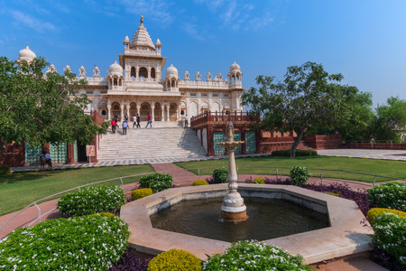 Jodhpur, Rajasthan, India - 20.10.2019 : Visitors enjoying beautiful decorated garden of Jaswant Thada cenotaph. Garden has carved gazebos, a tiered garden, and a small lake with nice view.のeditorial素材