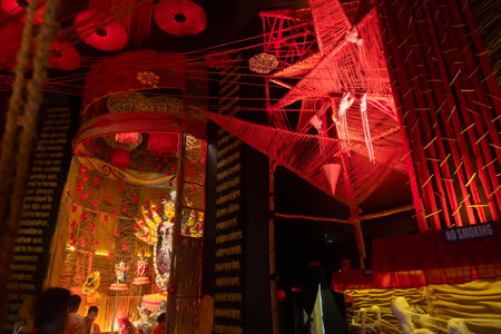 Howrah, West Bengal, India- 3rd October, 2022 : Beautifully decorated Durga idol is being worshipped inside puja pandal. Durga Puja is biggest festival of Hinduism, celebrated all over the world.のeditorial素材