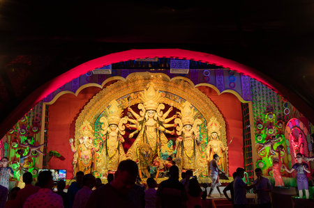 Howrah, West Bengal, India- 3rd October, 2022 : Devotees visiting nicely decorated Durga Puja pandal. Durga Puja is biggest festival of Hinduism. It is Unesco intangible cultural heritage.のeditorial素材