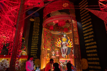 Howrah, West Bengal, India- 3rd October, 2022 : Beautifully decorated Durga idol is being worshipped inside puja pandal. Durga Puja is biggest festival of Hinduism, celebrated all over the world.のeditorial素材
