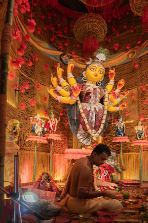 Howrah, West Bengal, India- 3rd October, 2022 : Beautifully decorated Durga idol is being worshipped inside puja pandal. Durga Puja is biggest festival of Hinduism, celebrated all over the world.のeditorial素材