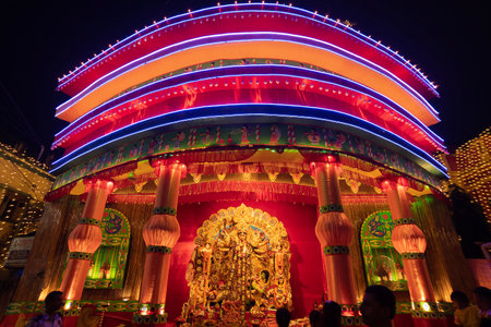Kolkata, West Bengal, India- 4th October, 2022 : Beautifullly decorated Durga Puja idol inside puja...