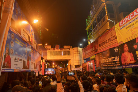 Kolkata, West Bengal, India- 4h October, 2022 : Hindu devotees gathered on decorated and illuminated street during Durga puja festival night to visit pandal.Durga puja is biggest festival of Hindusim.のeditorial素材