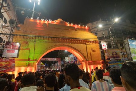 Kolkata, West Bengal, India- 4th October, 2022 : Devotees visiting illuminated and decorated Durga Puja pandal. Durga Puja is biggest festival of Hinduism. It is Unesco intangible cultural heritage.のeditorial素材