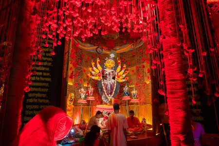 Howrah, West Bengal, India- 3rd October, 2022 : Beautifully decorated Durga idol is being worshipped inside puja pandal. Durga Puja is biggest festival of Hinduism, celebrated all over the world.のeditorial素材