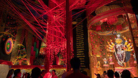 Howrah, West Bengal, India- 3rd October, 2022 : Beautifully decorated Durga idol is being worshipped inside puja pandal. Durga Puja is biggest festival of Hinduism, celebrated all over the world.のeditorial素材