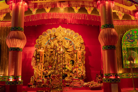 Kolkata, West Bengal, India- 4th October, 2022 : Beautifullly decorated Durga Puja idol inside puja pandal. Durga Puja is biggest festival of Hinduism, celebrated all over the world.のeditorial素材