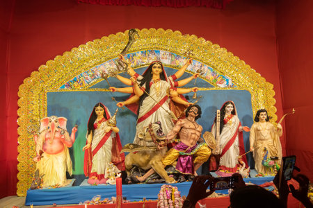 Kolkata, West Bengal, India- 4th October, 2022 : Beautifullly decorated Durga Puja idol inside puja pandal. Durga Puja is biggest festival of Hinduism, celebrated all over the world.のeditorial素材