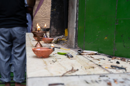 Lit oil lamps are common in Hindu temples. Lamp symbolizes the human body and flame symbolizes the...