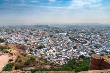 Top view of Jodhpur city as seen from famous Mehrangarh fort, Jodhpur, Rajasthan, India. Blue sky in the background. Mehrangarh Fort is UNESCO world heritage site popular amongst tourists worldwide.のeditorial素材