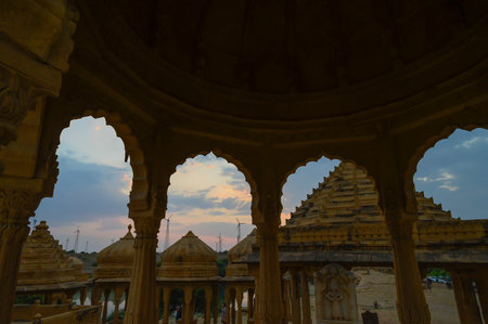 Silhouette of Bada Bagh or Barabagh, means Big Garden, is a garden complex in Jaisalmer, Rajasthan, India, for Royal cenotaphs of Maharajas means Kings of Jaisalmer state. Tourist attraction.の写真素材