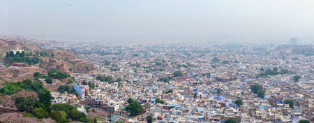 Panoramic view of Jodhpur city as seen from famous Mehrangarh fort, Jodhpur, Rajasthan, India. Blue sky in background. Mehrangarh Fort is UNESCO world heritage site popular amongst tourists worldwide.の写真素材